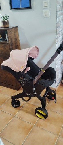 Poussette doona rose - i,